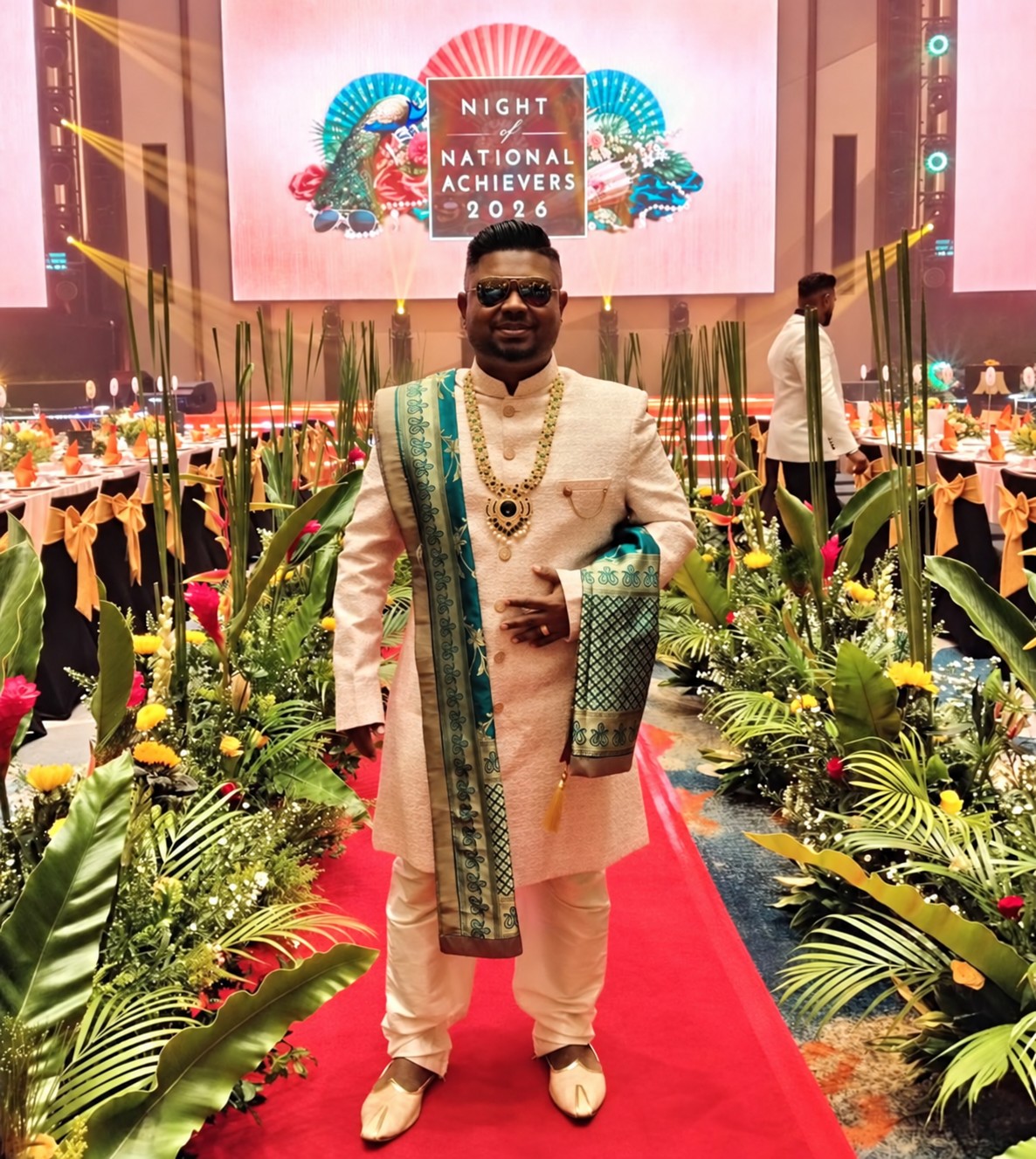 Kalidasan at a formal event